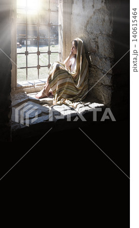 Lone girl sitting in the castle 140615464