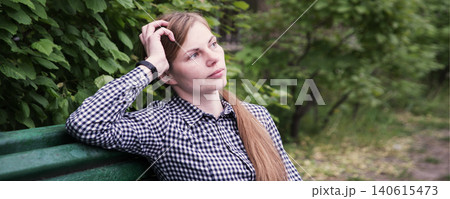 Young pretty girl on the bench Young pretty girl on the bench 140615473