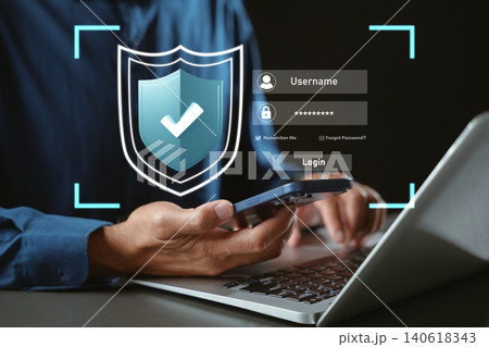 Secure network security technology for privacy, protect data and lock information, man logging into account using laptop and smartphone with virtual shield for cyber safety and identity Secure network security technology for privacy, protect data and lock information, man logging into account using laptop and smartphone with virtual shield for cyber safety and identity 140618343