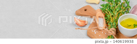 Olive oil thyme garlic and sea salt on light stone background with copy space Olive oil thyme garlic and sea salt on light stone background with copy space 140619938