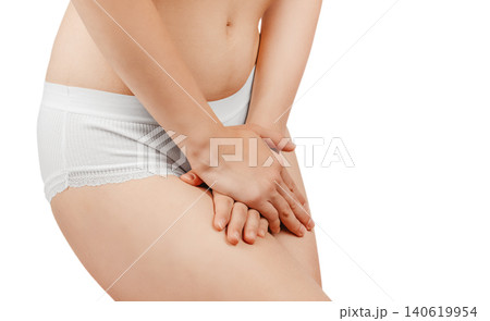 Woman holding groin with pain isolated on white background, intimate health and urinary infection concept Woman holding groin with pain isolated on white background, intimate health and urinary infection concept 140619954