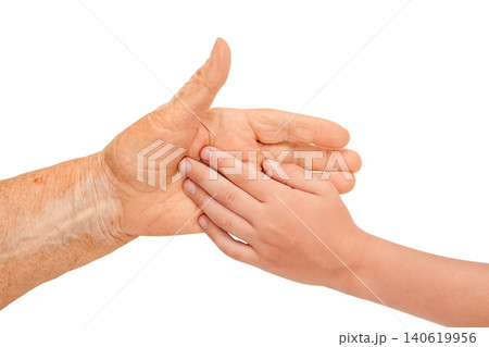 Child hand touching senior woman hand isolated on white background, family care and support concept Child hand touching senior woman hand isolated on white background, family care and support concept 140619956