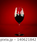 glass of wine isolated on red background 140621842