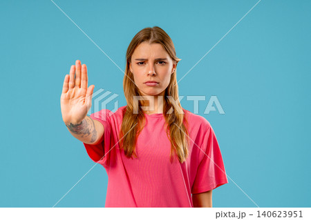 Uninterested Serious Woman Disapproving No Sign. Denying, Rejecting, Enough, stop crossing hands Uninterested Serious Woman Disapproving No Sign. Denying, Rejecting, Enough, stop crossing hands 140623951