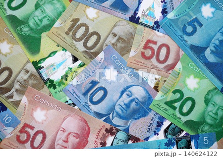 Canadian Dollar currency money bills. CAD currency banknotes in stack Canadian Dollar currency money bills. CAD currency banknotes in stack 140624122