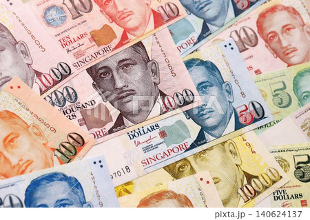 Singapore Dollar currency money bills. SGD currency banknotes in bunch Singapore Dollar currency money bills. SGD currency banknotes in bunch 140624137