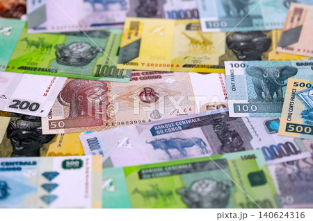 Congolese franc money bills in big amount on table close up. Rich life concept in Congo 140624316