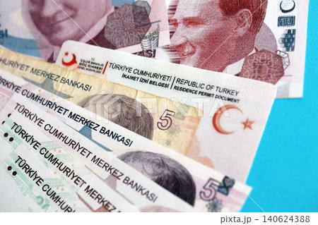 Turkey residence permit card document and turkish liras money bills banknotes. Permanent resident Turkey residence permit card document and turkish liras money bills banknotes. Permanent resident 140624388