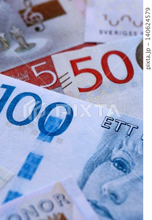 Swedish krona paper banknotes pile on table. Sweden SEK currency money bills in big amount Swedish krona paper banknotes pile on table. Sweden SEK currency money bills in big amount 140624579