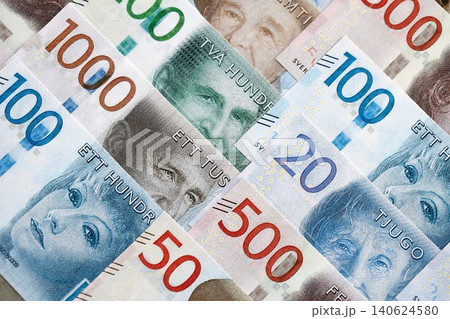 Swedish krona paper banknotes pile on table. Sweden SEK currency money bills in big amount Swedish krona paper banknotes pile on table. Sweden SEK currency money bills in big amount 140624580