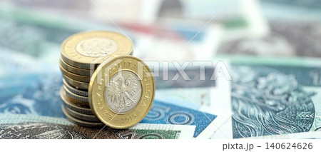 Coins and banknotes of Polish zloty and grosz currency. Poland PLN money close up. Business Coins and banknotes of Polish zloty and grosz currency. Poland PLN money close up. Business 140624626