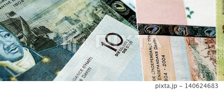 Haitian gourde money bills pile on table. Haiti banknotes of HTG currency. Concept of business 140624683