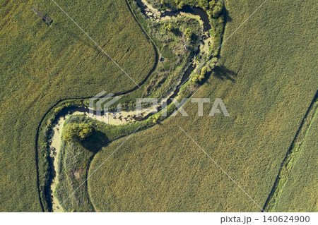 banks of a swampy river, aerial view 140624900
