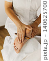 Close up of special foot massage therapy session. Female massage therapist's hands. 140625700