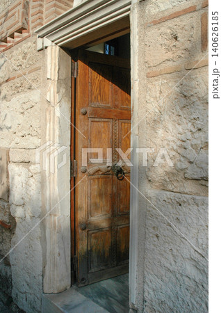 Traditional carved wooden door of the Church of the Holy Apostles in Athens Traditional carved wooden door of the Church of the Holy Apostles in Athens 140626185