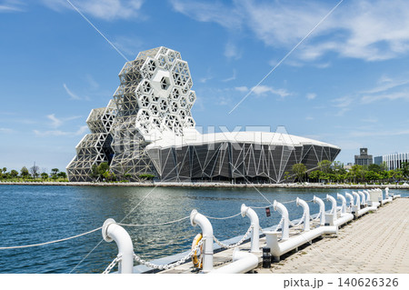 Close-up of Kaohsiung Music Center in Port of Kaohsiung, Taiwan. The white hexagonal building structure on the shore of Love Pier. 140626326