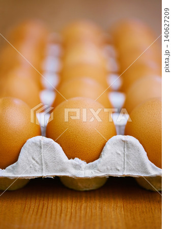 Agriculture, produce and eggs in carton for sustainable, organic food and reproduction with wellness. Diet, closeup and harvest from livestock for nutrition, breakfast or healthy meal on table Agriculture, produce and eggs in carton for sustainable, organic food and reproduction with wellness. Diet, closeup and harvest from livestock for nutrition, breakfast or healthy meal on table 140627209