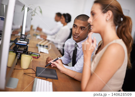 Business people, meeting and thinking with designer on computer for digital design or development at office. Young man, woman or creative employees working on desktop PC for project, tasks or startup 140628509