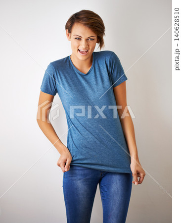 Portrait, fashion and happy with young woman in studio on white background for casual or relaxed style. Model, smile and clothes with confident person in trendy clothing outfit for natural chic Portrait, fashion and happy with young woman in studio on white background for casual or relaxed style. Model, smile and clothes with confident person in trendy clothing outfit for natural chic 140628510