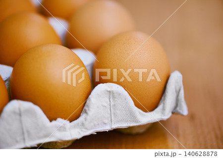 Agriculture, protein and eggs in carton for sustainable, organic food and reproduction with wellness. Diet, closeup and produce from livestock for nutrition, breakfast or healthy meal on table Agriculture, protein and eggs in carton for sustainable, organic food and reproduction with wellness. Diet, closeup and produce from livestock for nutrition, breakfast or healthy meal on table 140628878