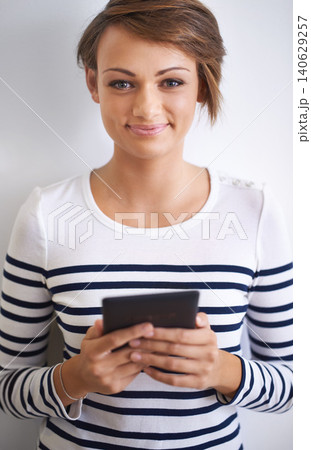 Woman, studio or portrait with tablet, happy and face for social media or communication. Girl, tech and smile with technology, online connection or internet message isolated on white background Woman, studio or portrait with tablet, happy and face for social media or communication. Girl, tech and smile with technology, online connection or internet message isolated on white background 140629257