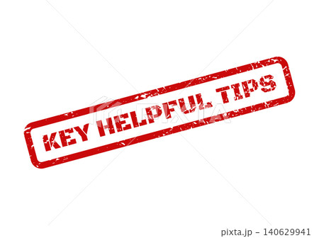 An isolated red textured rubber stamp displaying Key Helpful Tips for important guidance 140629941