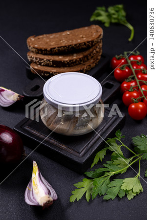 Pickled herring in jar with rye bread Pickled herring in jar with rye bread 140630736