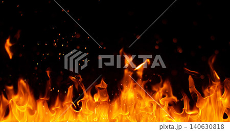 Burning orange flames with glowing embers isolated on black background. Realistic fire effect suitable for visual effects, compositing, motion graphics and video editing. Burning orange flames with glowing embers isolated on black background. Realistic fire effect suitable for visual effects, compositing, motion graphics and video editing. 140630818