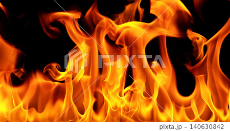 Burning orange flames with glowing embers isolated on black background. Realistic fire effect suitable for visual effects, compositing, motion graphics and video editing. 140630842