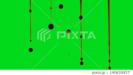 Realistic red blood drips and falling droplets isolated on green screen. Chroma key footage suitable for horror scenes, visual effects, compositing and video editing projects. 140630857