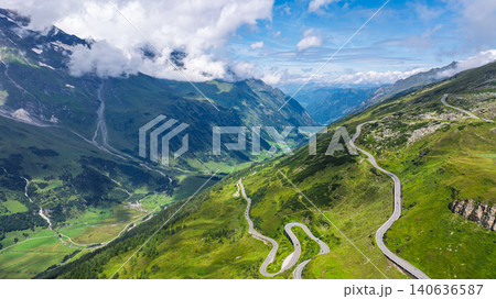 Winding mountain road through the Grossglockner High Alpine Road in the Austrian Alps summer Winding mountain road through the Grossglockner High Alpine Road in the Austrian Alps summer 140636587