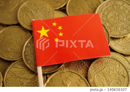 China flag on coin and banknote money, finance trading investment business currency. China flag on coin and banknote money, finance trading investment business currency. 140638307