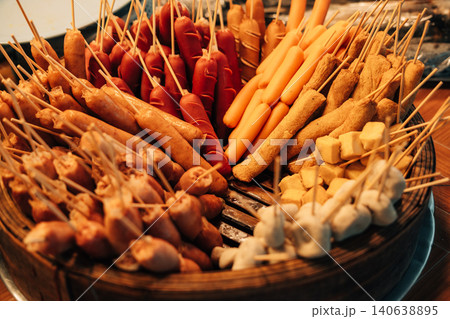 Delicious traditional Asian grilled meat skewers at a local street food market 140638895