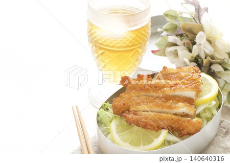 南蛮チキンカツ弁当とアイスティー 南蛮チキンカツ弁当とアイスティー 140640316