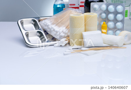 Wound care dressing set and stainless steel plate, forceps, cotton stick, conform bandage, elastic cohesive retention bandage, povidone-iodine, cotton ball with alcohol. Medical equipment for nurse. 140640607