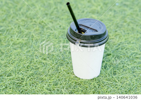 coffee on grass coffee on grass 140641036