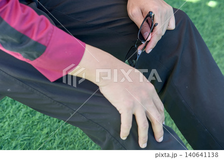 man in rubber gloves climbing equipment man in rubber gloves climbing equipment 140641138