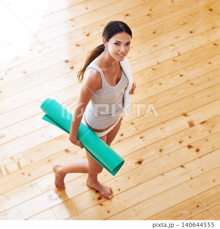 Woman, portrait and mat ready for yoga or wellness, health and meditation for spiritual awareness. Female person, pilates and exercise or fitness in living room, zen and mindfulness on mockup space 140644555