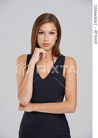 Fashion, formal and portrait of woman in dress with glamour, confidence and luxury in studio. Classic, chic and elegant style with girl on white background for designer clothes, pride and aesthetic 140644601