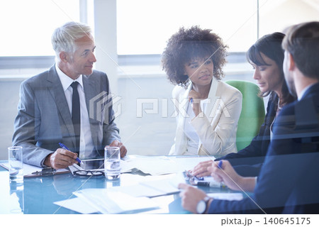 Business people, teamwork and documents at meeting in conference room for corporate planning, networking and diversity. Professional, employees and collaboration in office with lens flare or feedback Business people, teamwork and documents at meeting in conference room for corporate planning, networking and diversity. Professional, employees and collaboration in office with lens flare or feedback 140645175