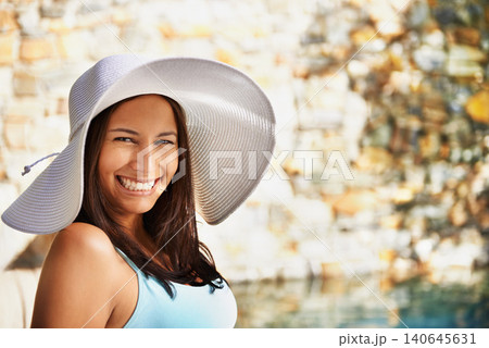 Pool, smile and portrait of woman with sun hat for summer holiday, travel and relax at luxury resort. Happy, female person and vacation at retreat for weekend, break and adventure for wellness Pool, smile and portrait of woman with sun hat for summer holiday, travel and relax at luxury resort. Happy, female person and vacation at retreat for weekend, break and adventure for wellness 140645631