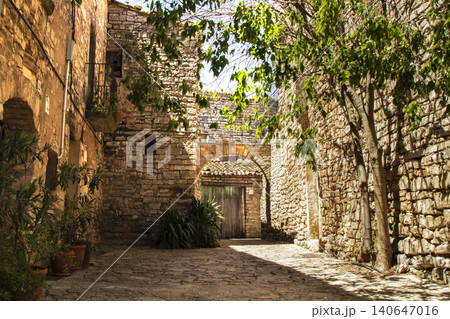 Montfalc? murallat medieval walled village alleyway Montfalc? murallat medieval walled village alleyway 140647016