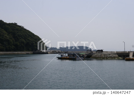 Coastal Harbor with Boats and Greenery Coastal Harbor with Boats and Greenery 140647247