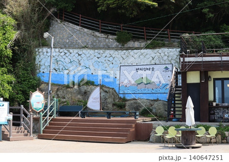 Coastal Mural and Outdoor Seating Area 140647251