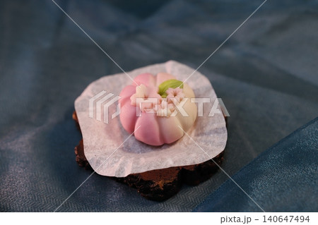 Delicate Pink and White Sweet Treat on Chocolate Base Delicate Pink and White Sweet Treat on Chocolate Base 140647494
