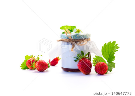 Fresh strawberries and jam isolated on white Fresh strawberries and jam isolated on white 140647773