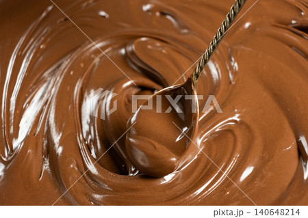 Natural chocolate nut butter in a spoon Natural chocolate nut butter in a spoon 140648214