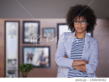 Home office, portrait and confident businesswoman with glasses, pride and professional at window. Female person, business and woman with arms crossed for break or startup and entrepreneur indoors Home office, portrait and confident businesswoman with glasses, pride and professional at window. Female person, business and woman with arms crossed for break or startup and entrepreneur indoors 140648482