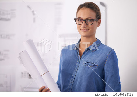 Woman, architecture and portrait with blueprint for construction, design and engineering with paperwork at office. Architect, contractor and sketch of floor plan for renovation with creativity Woman, architecture and portrait with blueprint for construction, design and engineering with paperwork at office. Architect, contractor and sketch of floor plan for renovation with creativity 140648815