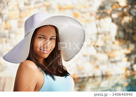 Smile, sun hat and portrait of woman at resort for summer holiday, travel and break by pool. Relax, happy and female person with happiness for vacation, weekend trip or luxury retreat for wellness Smile, sun hat and portrait of woman at resort for summer holiday, travel and break by pool. Relax, happy and female person with happiness for vacation, weekend trip or luxury retreat for wellness 140648940